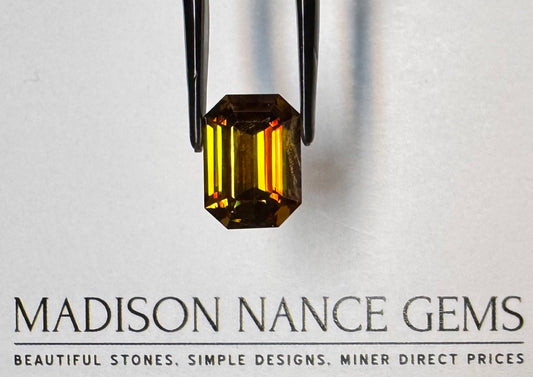 Sphene, Golden Emerald Cut, 7.13 cts.